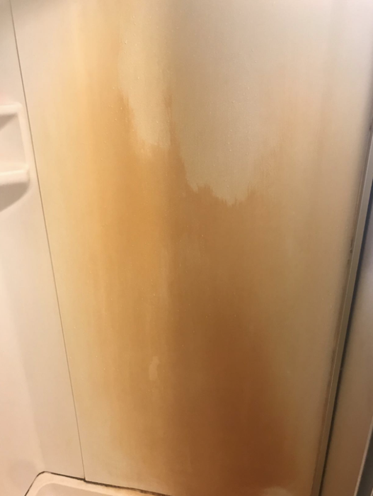 rusty shower surround