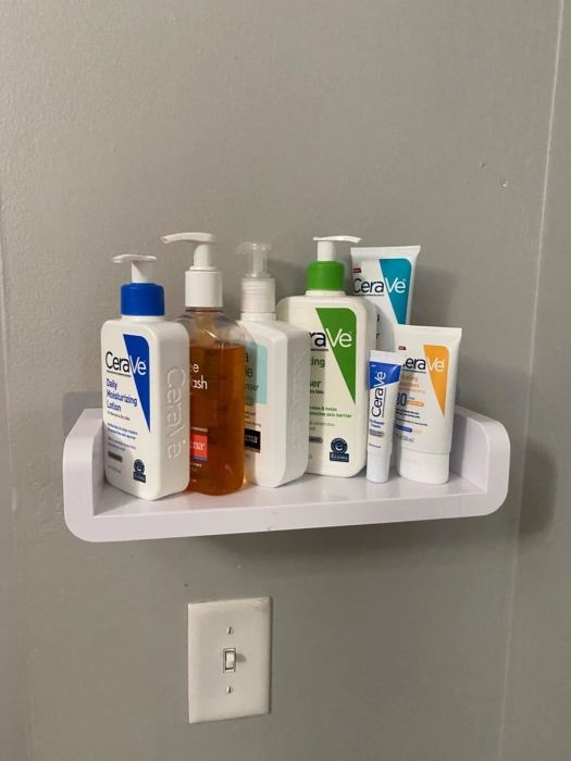Photo of the shelf neatly holding various toiletries