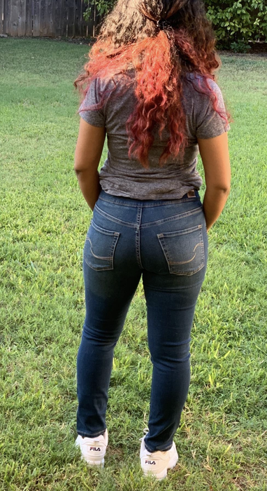 Reviewer image showing the back with functional pockets.