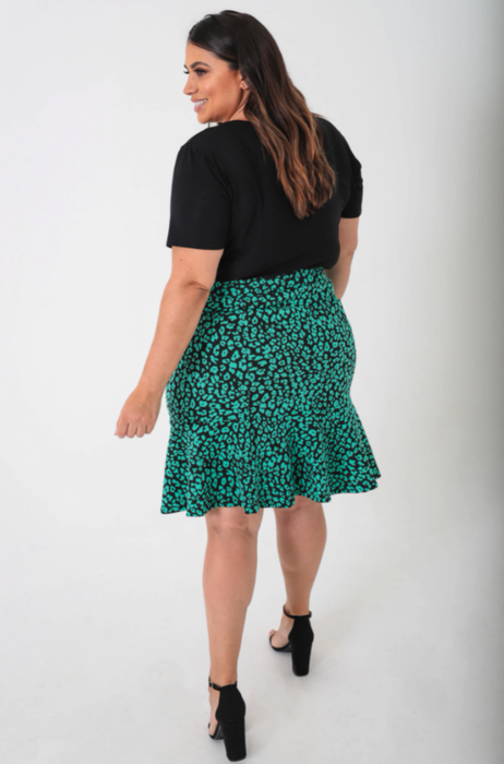 A back view of a model wearing the skirt.