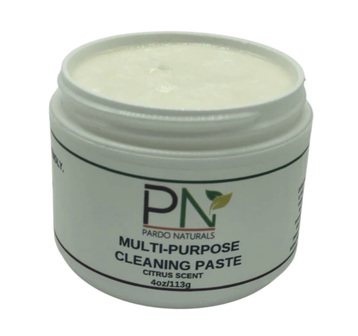 A white jar filled with white paste, displayed against a white background