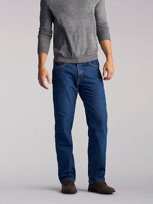 The lower portion of a model wearing straight-leg blue jeans
