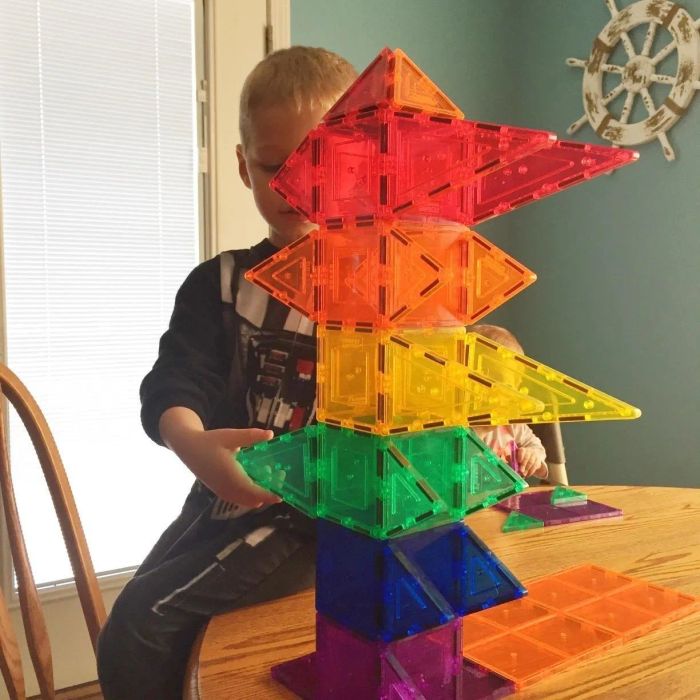 A reviewer's photo showcasing a creation made with the colorful magnetic tiles