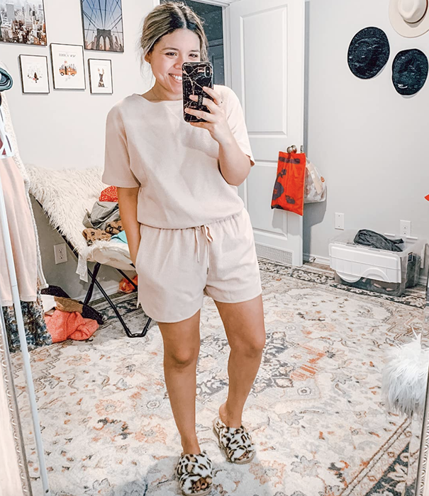 reviewer showcasing the pink set