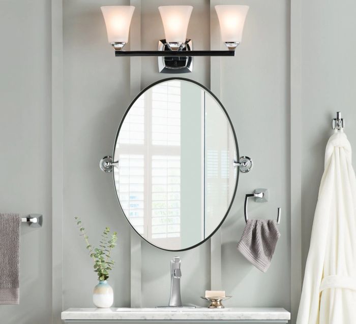 The oval-shaped mirror