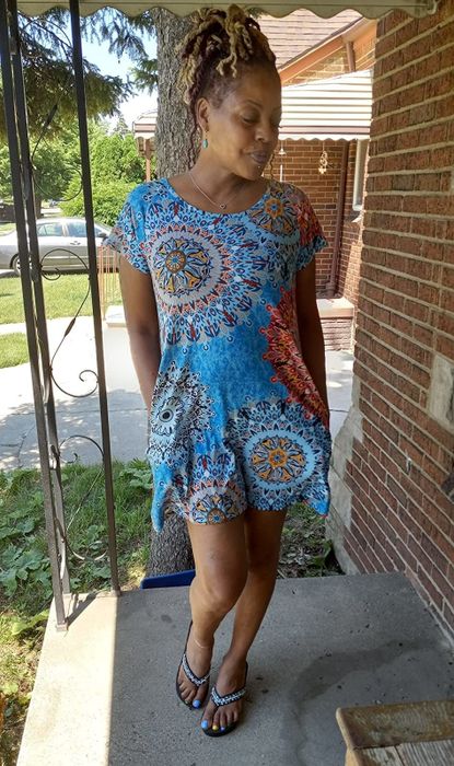 reviewer wearing the bohemian-style dress