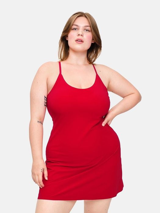 Model showcasing the red workout dress.