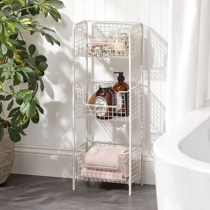 The light cream-colored basket shelf.