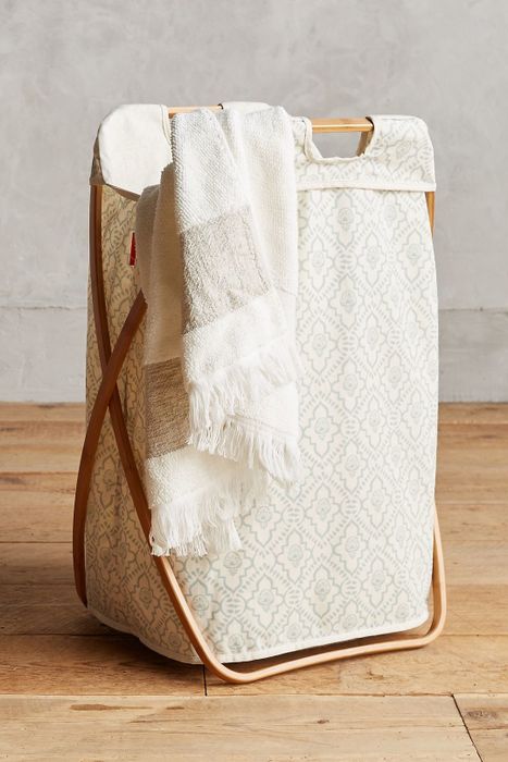 The cream and blue laundry hamper.