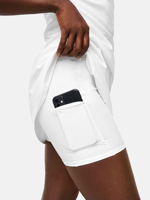 Model demonstrating the shorts worn underneath the workout dress.