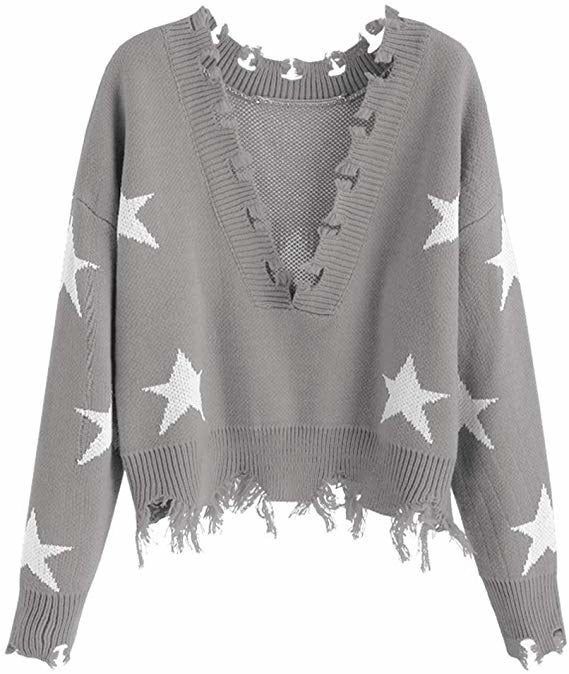 A grey sweater featuring white stars printed on it.