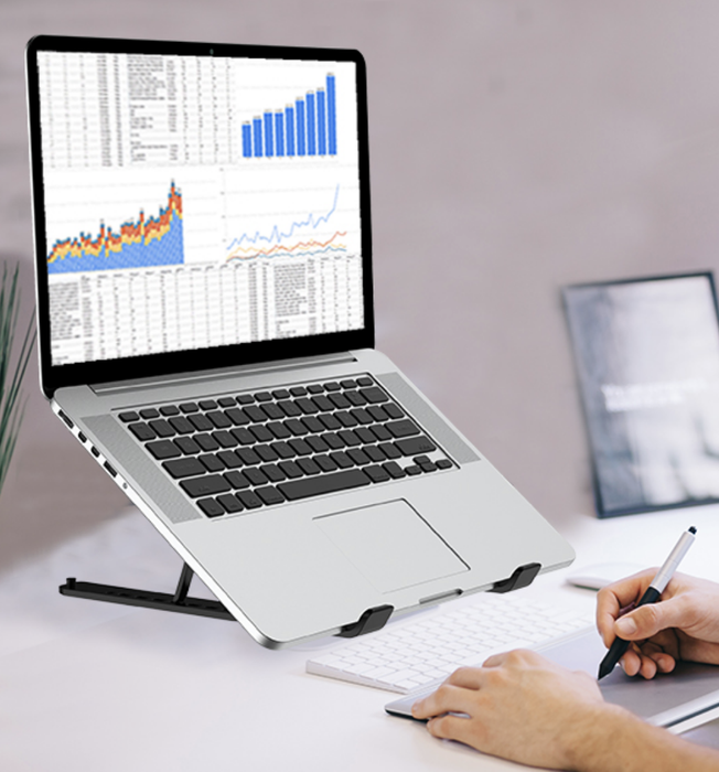 A close-up shot of a laptop placed on a stand