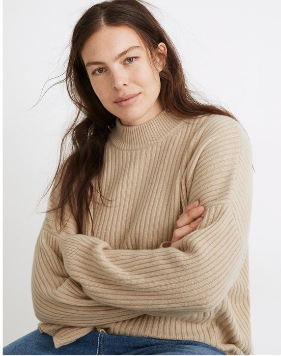a ribbed cashmere-blend mockneck sweater in a camel hue