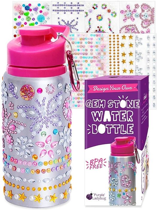 A water bottle adorned with sparkling rhinestone glitter gem stickers.