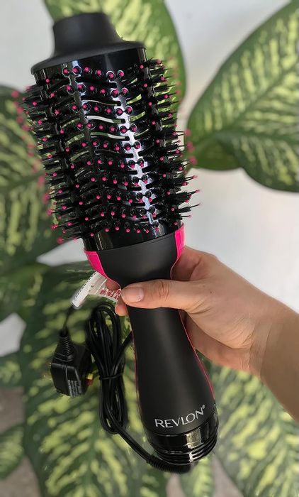 The reviewer holding their trusty hair dryer
