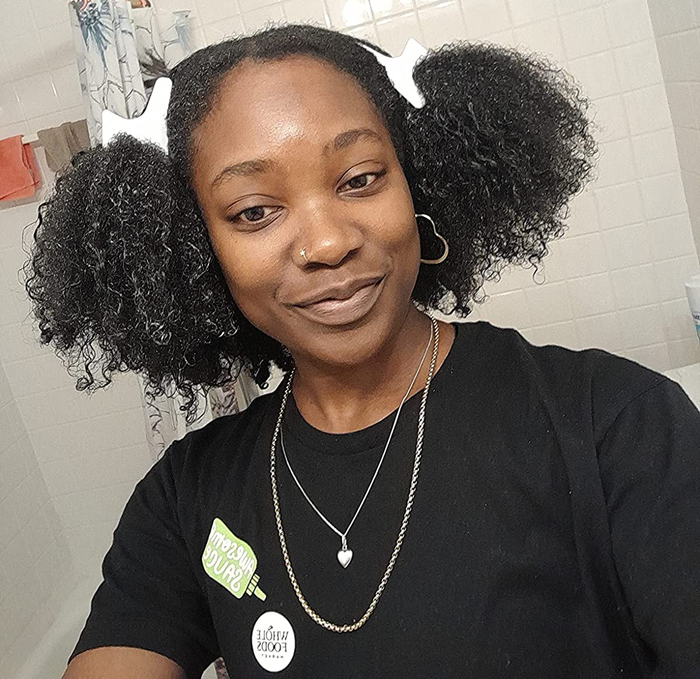 a reviewer with smooth, detangled coils