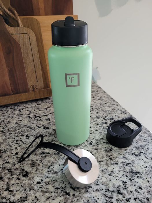 The iron flask in a refreshing mint green color, perfect for on-the-go hydration.