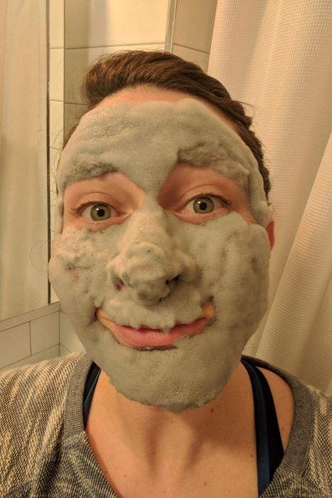 A reviewer with a face covered in large amounts of foam