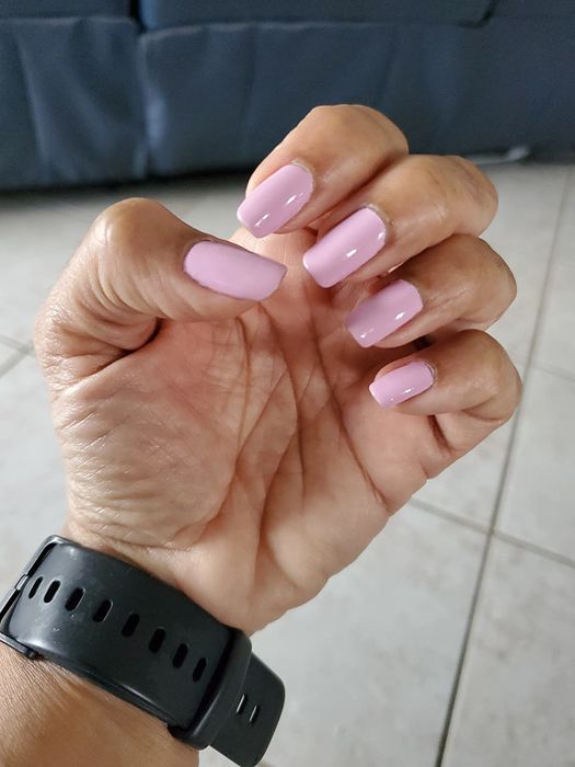 A reviewer's manicure after using the gel-effect top coat