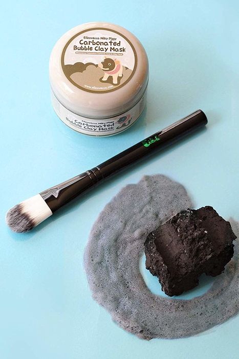 Product packaging featuring a brush