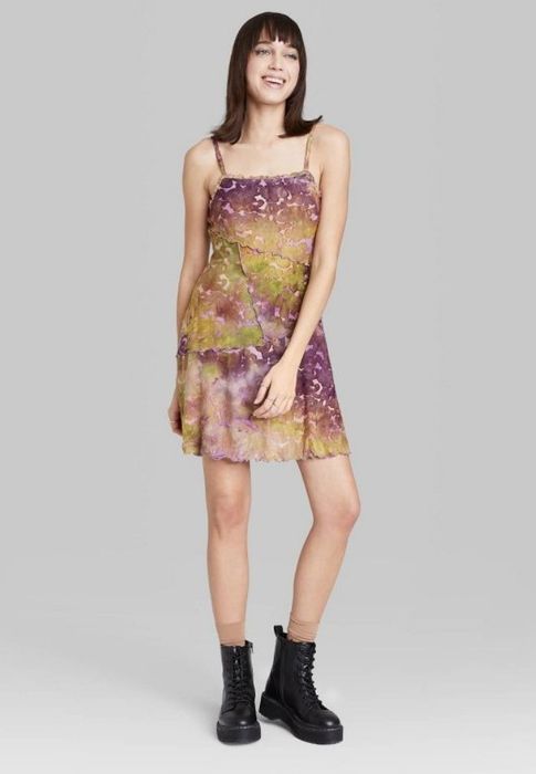 A model showcasing a mauve tie-dye dress