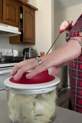 A GIF of a reviewer effortlessly using the chopper.