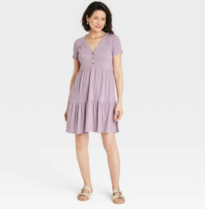 A model in a lilac A-line dress