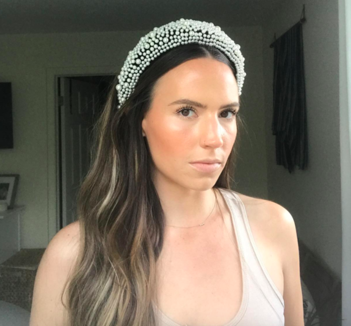 A customer review photo featuring them wearing the headband.