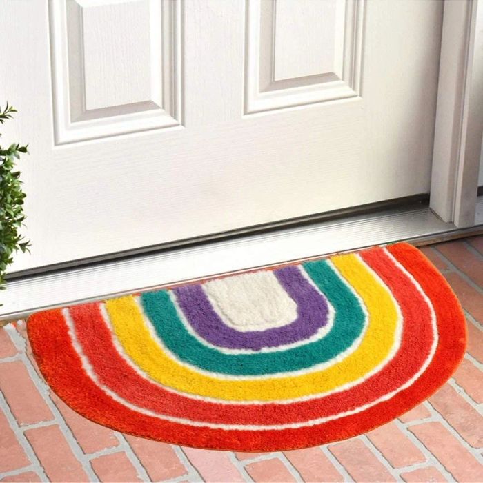 A vibrant rainbow doormat to brighten up any doorstep.