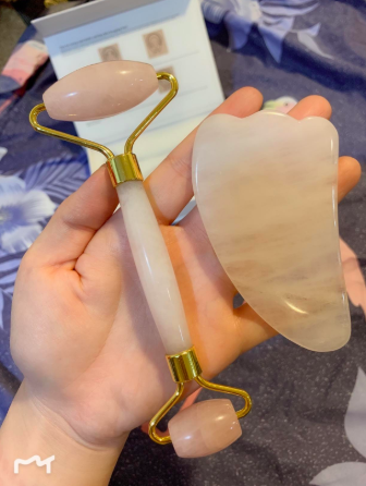 a reviewer holding the massagers