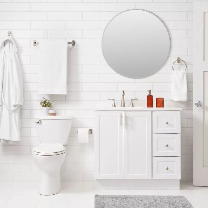 The nickel hardware set displayed in a bathroom setting.