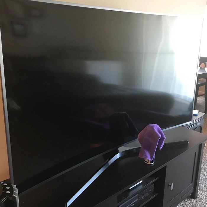 A photo showing the same TV screen now spotless and clean.