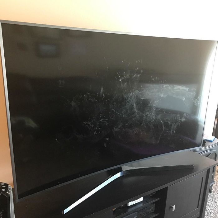 A photo showing a TV screen covered in smudges.