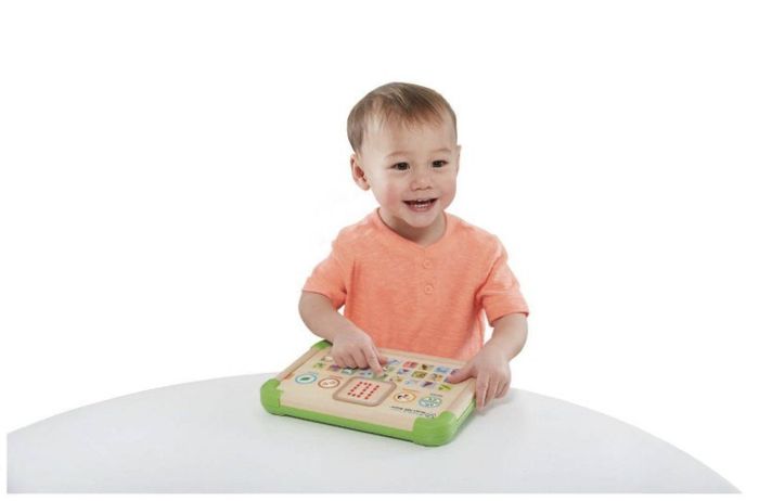 A child engaged with a touch-responsive board, learning and interacting with the device.