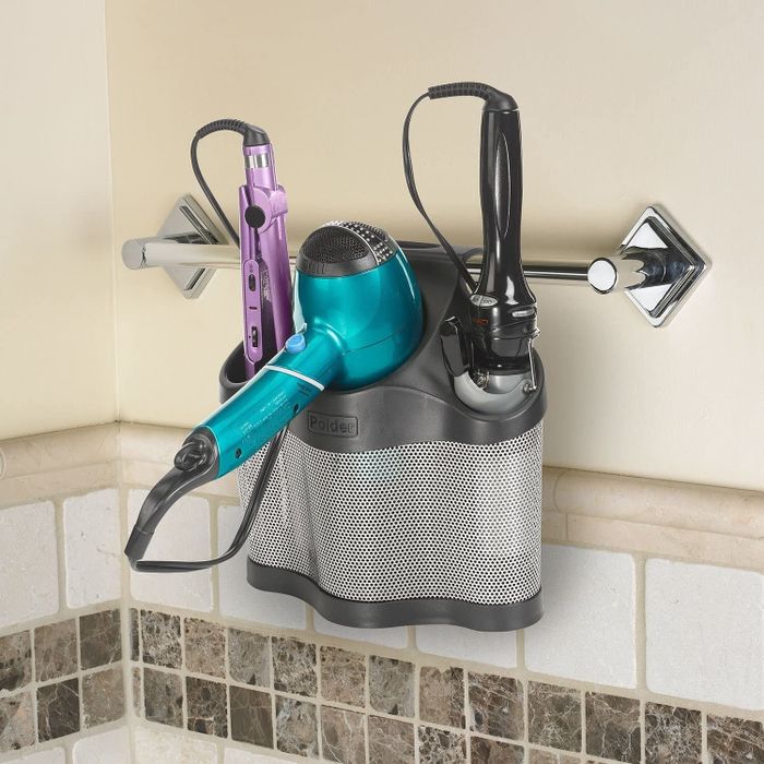 A convenient styling station for hair tools that hangs neatly on a towel rack