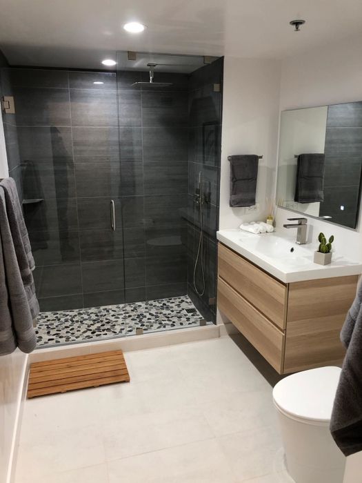 The bamboo mat placed outside a shower