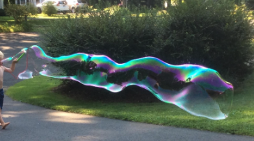 a remarkably long, swirling bubble