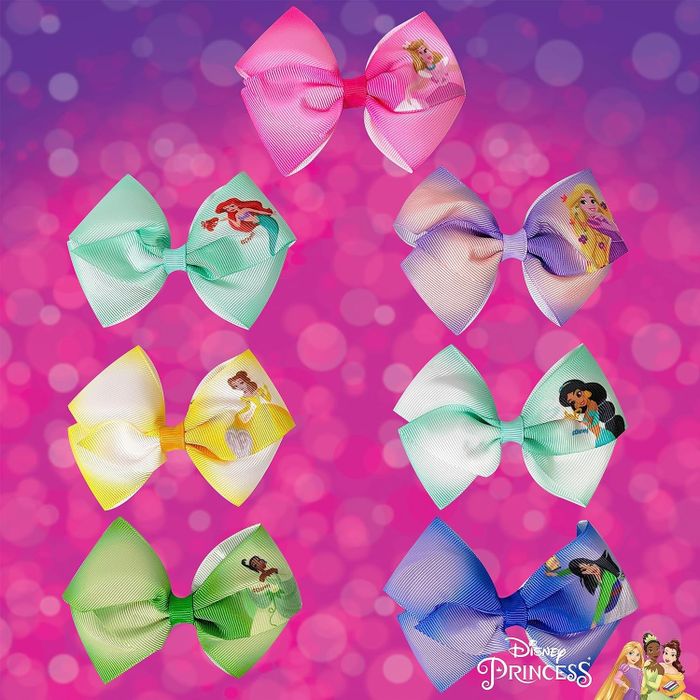 a collection of seven Disney princess-themed hair bows