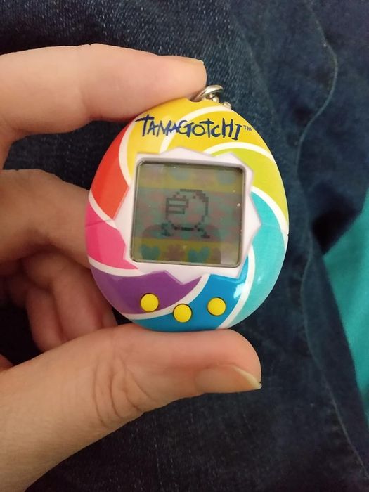 a Tamagotchi with a candy-swirl design