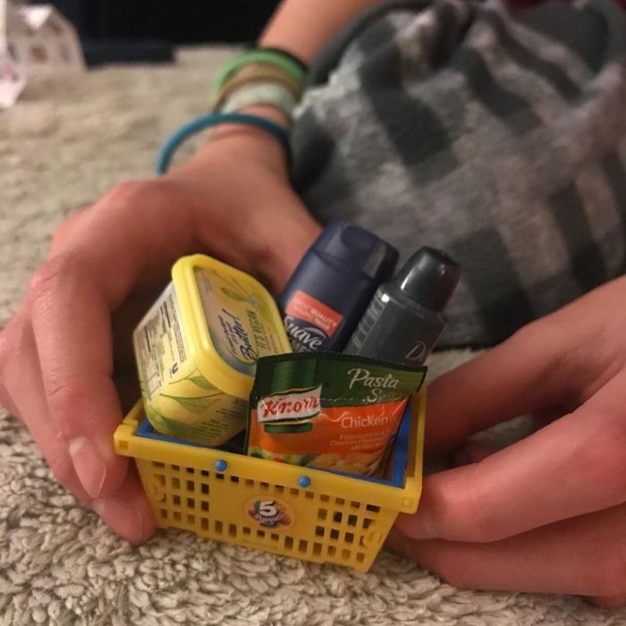 A reviewer’s photo displaying the mini brand replicas found inside the mystery ball