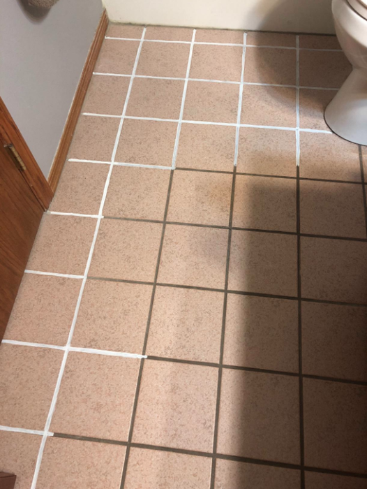 Photo from a reviewer displaying tiles before applying the grout ink pen.