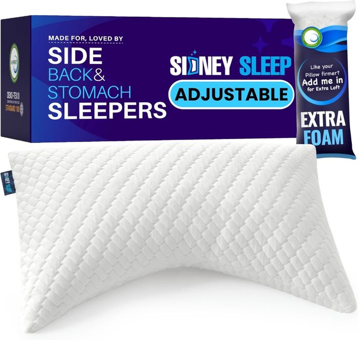 The packaging of Sidney Sleep's adjustable pillow is showcased, designed to cater to side, back, and stomach sleepers by incorporating additional foam for enhanced firmness.