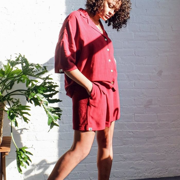 A model styled in the vibrant red set