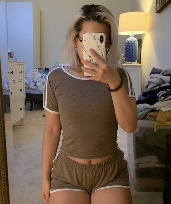 reviewer wearing the grey set