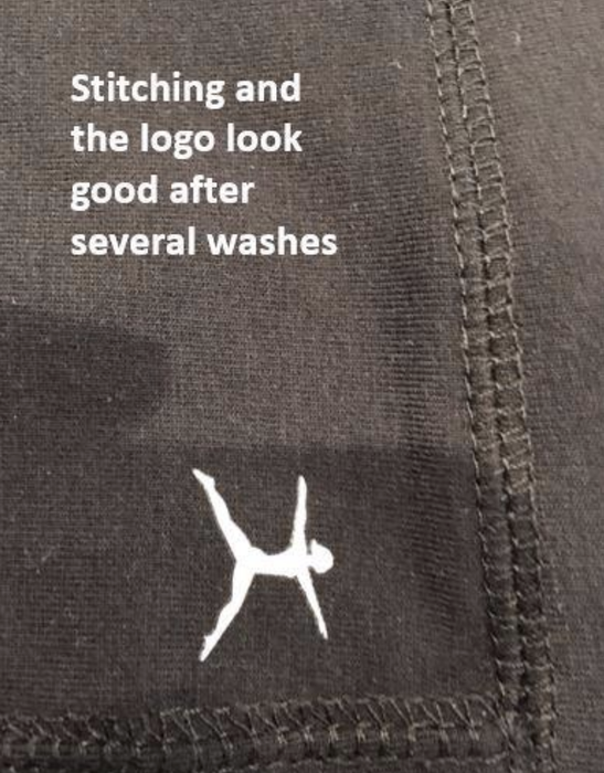 close-up of the pants with a note stating, 