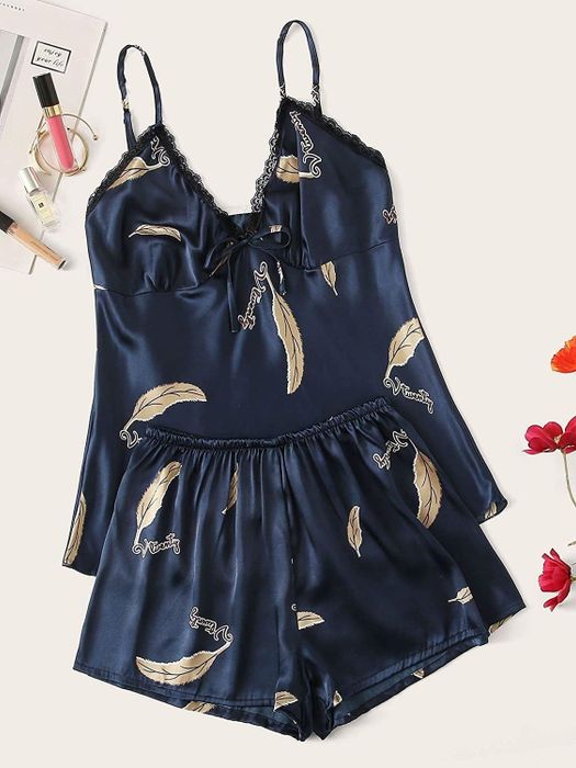 The elegant blue satin ensemble featuring a feather motif