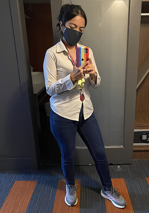 Image of reviewer wearing a white button-up shirt