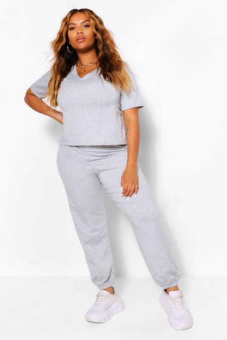 model wearing the grey set