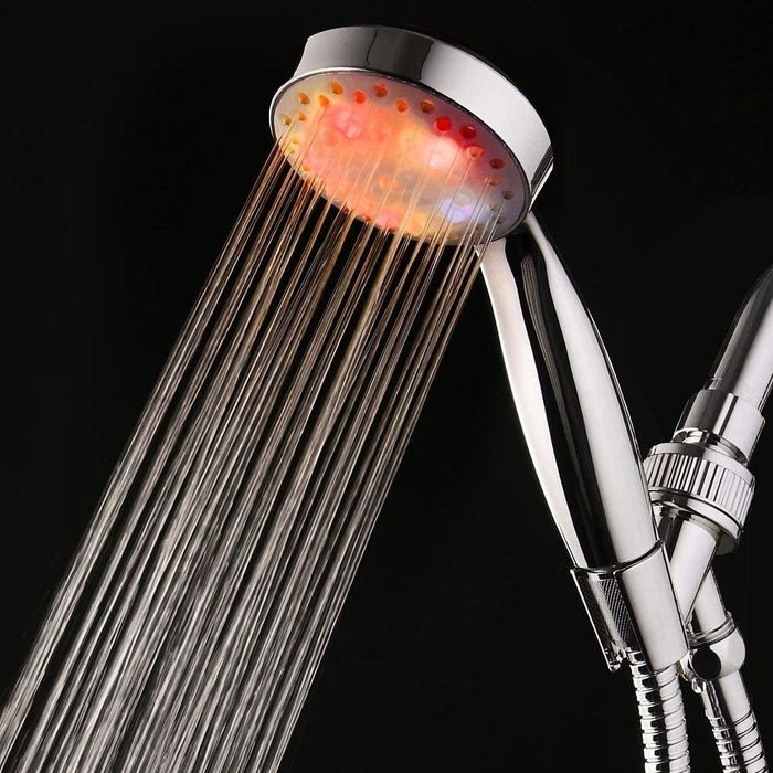 Close-up view of a showerhead with color-changing LED lights