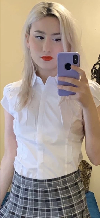 Image of reviewer wearing a white shirt